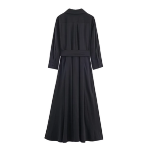 Back view of black long sleeve midi shirt dress with waisted design and large hem