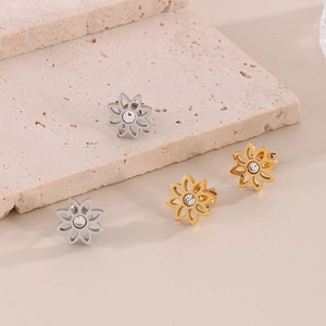 Daisy flower earrings set in gold and silver finish with rhinestones on stone base