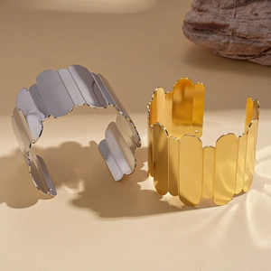 Minimalist wide wave geometric open cuff bracelet in gold and silver metal finishes
