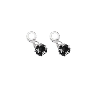 Silver metal drop earrings featuring black round gems and secure claw setting design