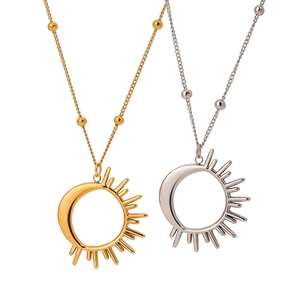 Detailed view of gold and silver sun and moon necklaces with fine beaded chains