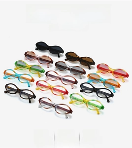 Collection of retro oval sunglasses in various colors with vintage narrow frames