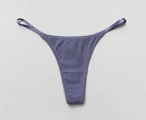 Detail shot of purple ribbed cotton G-string featuring slim straps and soft texture