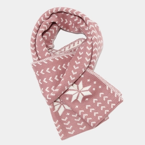 Close-up of pink and cream knit scarf with nordic snowflake patterns and warm texture