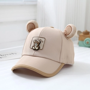 Detail of toddler baseball cap featuring 3D bear ears and cute cartoon patch decoration