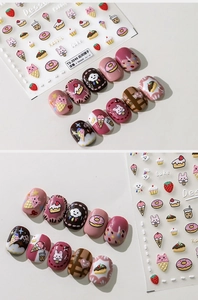 Macro detail of 3D embossed nail stickers featuring dessert, rabbit, and strawberry motifs