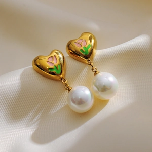 Elegant gold heart earrings with pink tulip pattern and hanging white round pearl