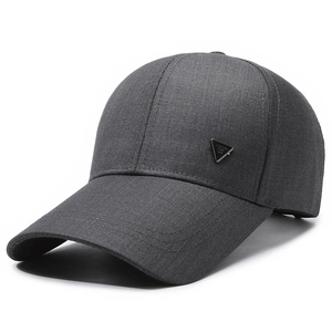 Dark grey baseball cap in twill fabric with a distinctive triangular metal side badge