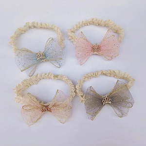 Set of four infant lace headbands with colorful mesh bows and gold crown decorations