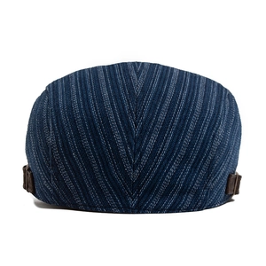 Retro denim newsboy hat with white pinstripes and brown leather back strap adjustment