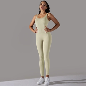 Detail of ribbed seamless one-piece yoga jumpsuit in cream beige with slim fit design