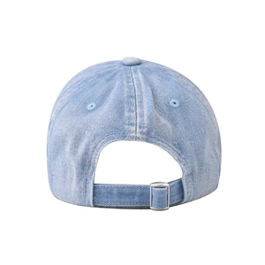 Detail of light blue washed denim cap back showing silver adjustable metal buckle closure