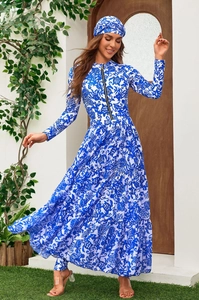 Close-up of blue floral long-sleeve burkini with zipper detail and tiered skirt layers