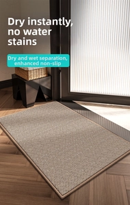 Detail view of beige woven absorbent kitchen mat with non-slip backing and reinforced edges
