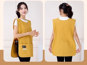 Front and back views of a yellow waterproof apron vest with adjustable buckles and pockets