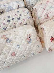 Quilted cotton cosmetic bags with floral and animal prints for stationery and travel use