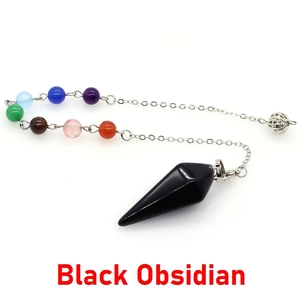 Macro view of black obsidian dowsing pendulum with seven colorful energy beads and chain