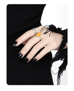 Detail of square orange turquoise inlay on textured S925 sterling silver geometric ring