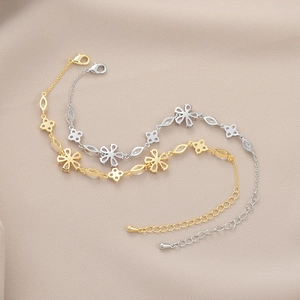 Elegant gold and silver bracelets featuring zircon flower petals and clover leaf design