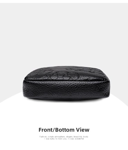 Vue détaillée du fond du sac en cuir noir avec motifs de roses en relief et coutures
