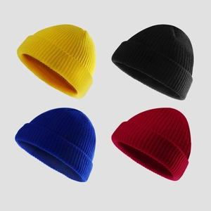 Winter knit beanies for men and women in yellow, black, blue, and burgundy colors