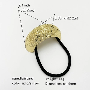 Detail view of the golden metal hairband showing dimensions 5.25cm by 2.2cm and 14g weight