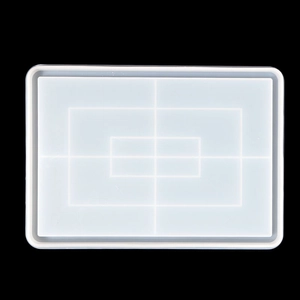 Top view of rectangular white silicone mold with alignment grid for DIY resin crafts