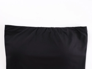 Detail shot of black elastic knit bandeau top featuring ruffled texture and top hem gathering