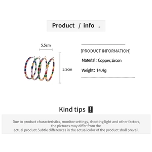 Detail view of 5.5cm copper hoop earrings with colorful rectangular zircon stones