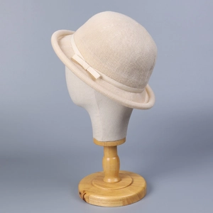 Breathable cream knit bowler hat for women featuring a stylish grosgrain ribbon bow