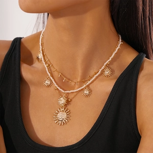 Three-layer gold metal necklace set with pearl accents and sunflower pendant jewelry