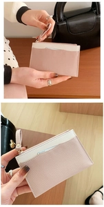Pink and white lychee leather coin purse with wrist strap and gold zipper detail