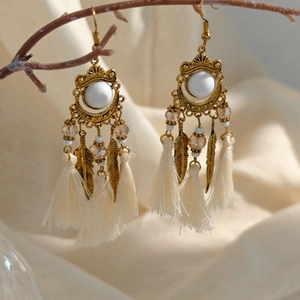 Bohemian vintage tassels earrings with golden feathers and cream cotton beads