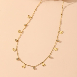 Golden stainless steel necklace featuring hollow butterfly charms and round zircon accents