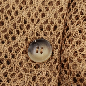 Women's mesh beach set featuring brown crochet fabric and a gradient resin button detail