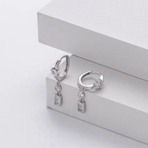 Detailed close-up of S925 sterling silver star hoop earrings with zircon pendant