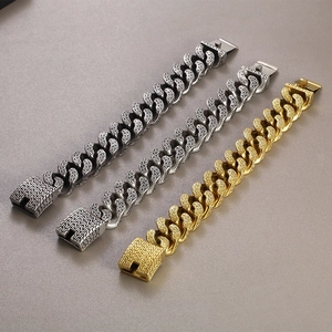 Detailed view of three punk trident curb bracelets in silver, platinum, and gold finishes