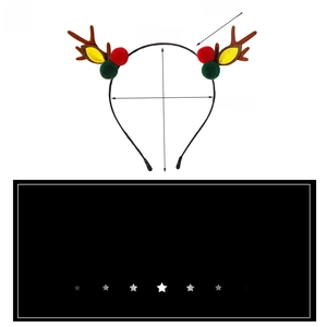 Detailed view of Christmas reindeer headband with brown antlers and colorful pom-poms