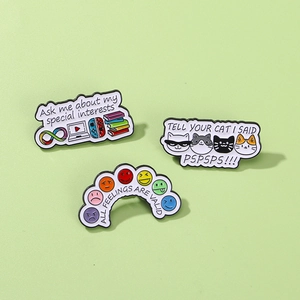 Enamel lapel pins set with 'Ask me about my special interests' and cat lover quotes