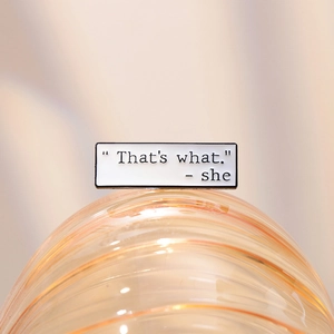 Funny enamel pin with That's what she said quote on textured background for clothing decor