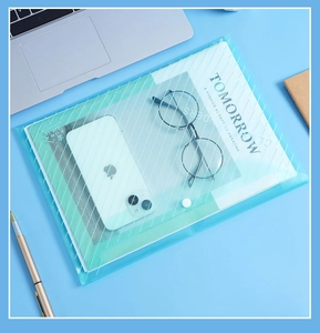 Detail of blue translucent A4 document bag with secure snap button and stripe pattern