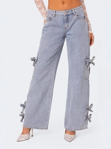 Light blue wide-leg denim jeans featuring stylish bow ties and cargo pockets for women