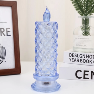 Detail of light blue crystal rose lamp with diamond facets and flickering LED flame effect