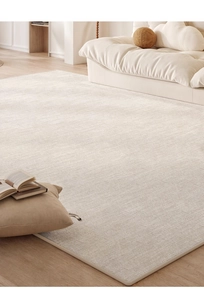 Macro shot of beige short-pile carpet texture with high-quality edge stitching details