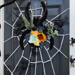 Couronne d'Halloween en forme d'araignée avec tournesols et fleurs artificielles colorées