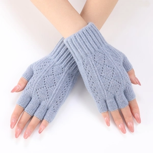 Detail of light blue fingerless arm warmers with diamond hollow out knitted pattern