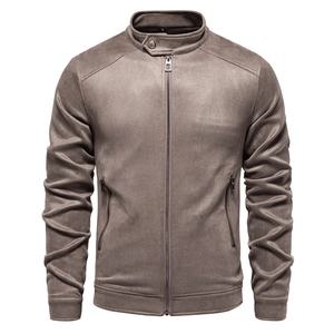 Detailed view of grey-brown faux suede jacket with zipper pockets and ribbed cuffs