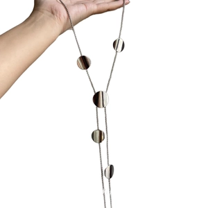 Elegant silver metallic necklace with polished round disc pendants and adjustable chain