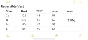 Detailed size chart for reversible puffer vest showing chest and length measurements