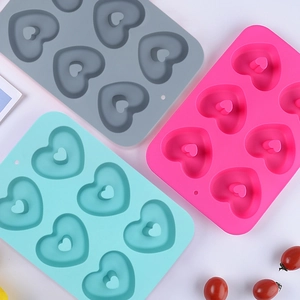 Food grade silicone heart donut molds in grey, pink and cyan colors for DIY baking